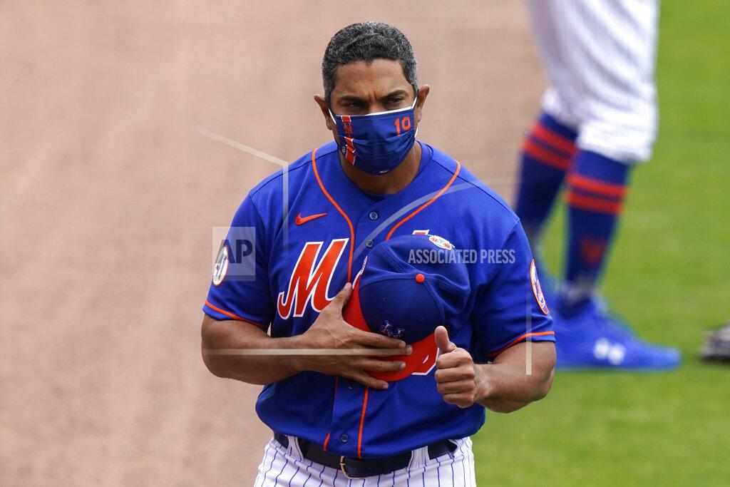 Lynne Sladky New York Mets manager Luis Rojas gives a thumbs-up during a spring training baseball game against the Washington Nationals, Thursday, March 4, 2021, in Port St. Lucie, Fla. (AP Photo/Lynne Sladky)