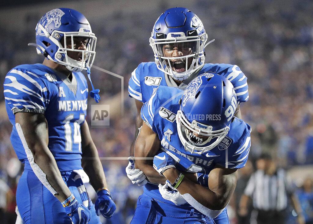 Jim Weber Memphis receiver Calvin Austin III, right front, celebrates a touchdown with Damonte Coxie and Antonio Gibson, left, during an NCAA college football game against Tulane on Saturday, Oct. 19, 2019, in Memphis, Tenn. (Jim Weber/Daily Memphian via AP)