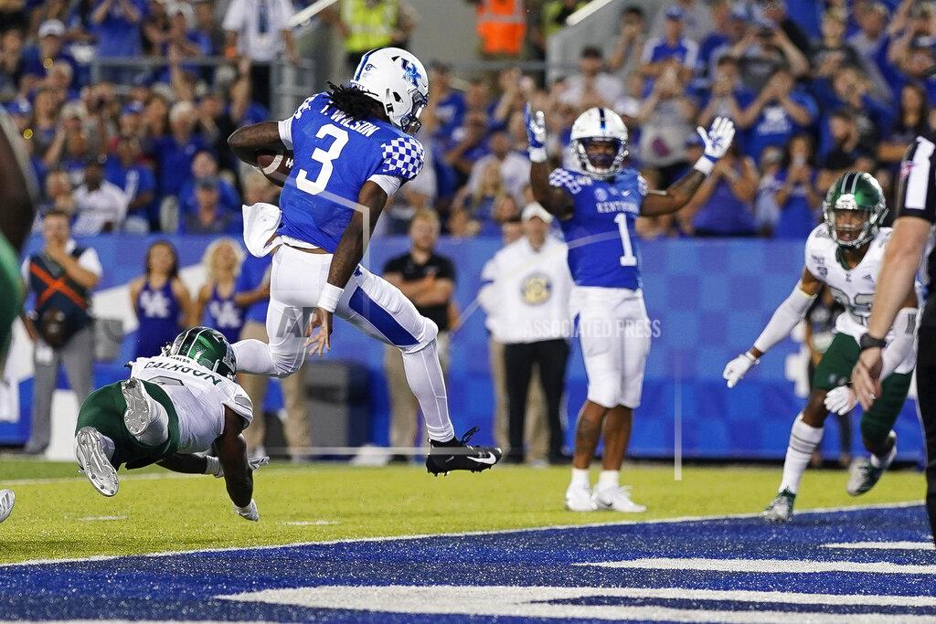 Bryan Woolston Kentucky quarterback Terry Wilson (3) scores a touchdown during the second half of an NCAA college football game between Kentucky and Eastern Michigan, Saturday, Sept. 7, 2019, in Lexington, Ky. (AP Photo/Bryan Woolston)