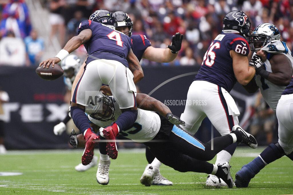 Eric Christian Smith Houston Texans quarterback Deshaun Watson (4) is pressured by Carolina Panthers defensive end Bruce Irvin (55) during the first half of an NFL football game Sunday, Sept. 29, 2019, in Houston. (AP Photo/Eric Christian Smith)