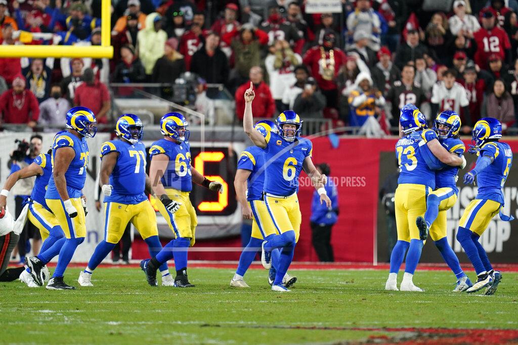 John Raoux Los Angeles Rams holder Johnny Hekker (6) celebrates with teammates after kicker Matt Gay kicked the game-winning field goal against the Tampa Bay Buccaneers during the final seconds of an NFL divisional round playoff football game, Sunday, Jan. 23, 2022, in Tampa, Fla. (AP Photo/John Raoux)