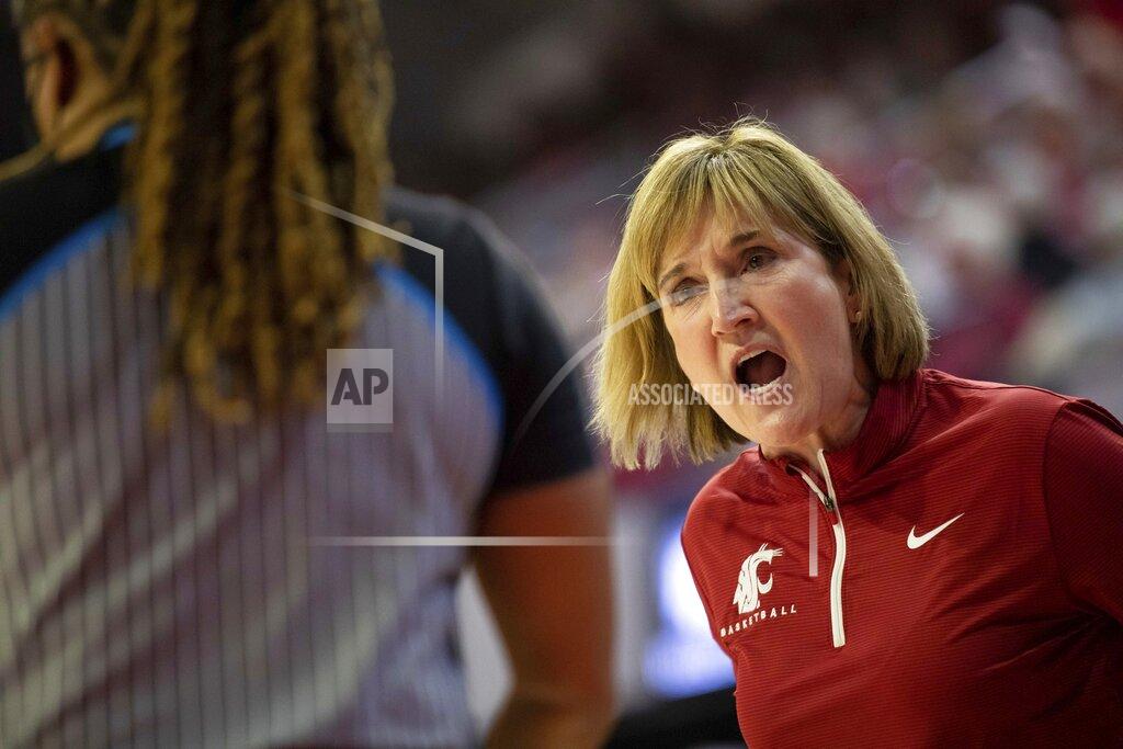 Ben Mckeown Washington State head coach Kamie Ethridge shouts at an official during the second half of a college basketball game against Kansas State in the first round of the NCAA tournament in Raleigh, N.C., Saturday, March 19, 2022. (AP Photo/Ben McKeown)