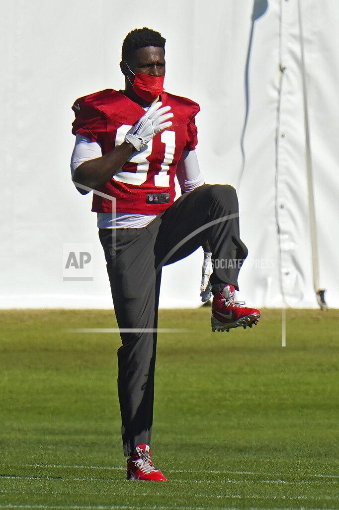 Chris O'meara Tampa Bay Buccaneers wide receiver Antonio Brown (81) stretches during an NFL football practice Wednesday, Jan. 6, 2021, in Tampa, Fla. The Buccaneers play the Washington Football Team in a playoff game Saturday night. (AP Photo/Chris O'Meara)