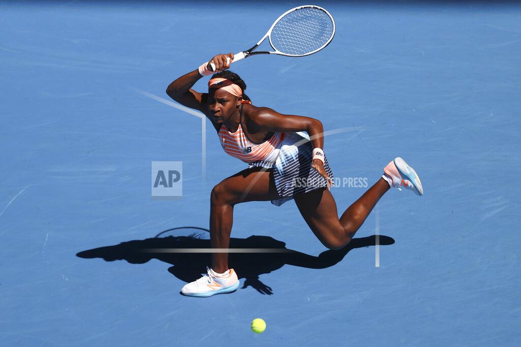 Hamish Blair United States' Coco Gauff makes a forehand return to Switzerland's Jil Teichmann during their first round match at the Australian Open tennis championship in Melbourne, Australia, Tuesday, Feb. 9, 2021.(AP Photo/Hamish Blair)