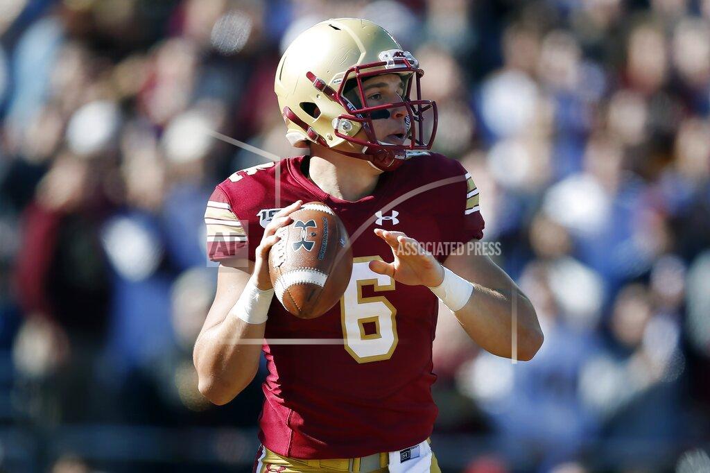 Michael Dwyer Boston College quarterback Dennis Grosel looks to pass during the first half of an NCAA college football game against North Carolina State in Boston, Saturday, Oct. 19, 2019. (AP Photo/Michael Dwyer)
