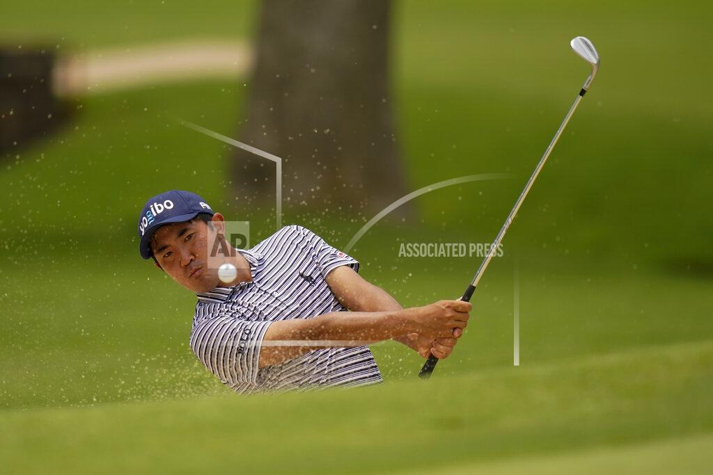 Eric Gay Takumi Kanaya, of Japan, hits from the bunker on the third hole during a practice round for the PGA Championship golf tournament, Tuesday, May 17, 2022, in Tulsa, Okla. (AP Photo/Eric Gay)