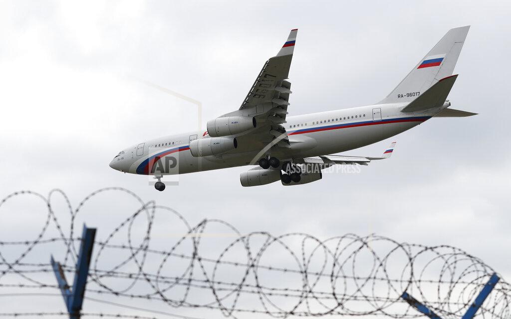 Petr David Josek Russian special government plane land at the Vaclav Havel airport in Prague, Czech Republic, Monday, April 19, 2021. Czech Republic is expelling 18 diplomats identified as spies over a 2014 ammunition depot explosion. On Saturday, April 17, 2021, Prime Minister Andrej Babis said the Czech spy agencies provided clear evidence about the involvement of Russian military agents in the massive explosion that killed two people. (AP Photo/Petr David Josek)