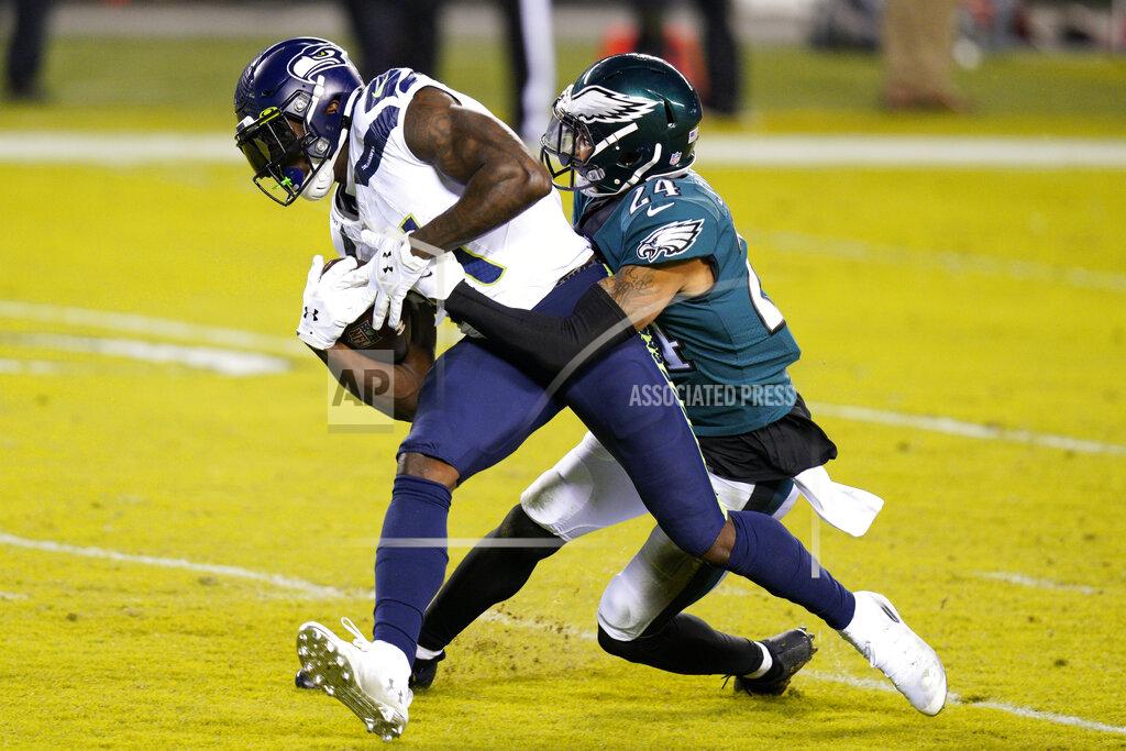 Chris Szagola Seattle Seahawks' DK Metcalf, left, is tackled by Philadelphia Eagles' Darius Slay during the first half of an NFL football game, Monday, Nov. 30, 2020, in Philadelphia. (AP Photo/Chris Szagola)