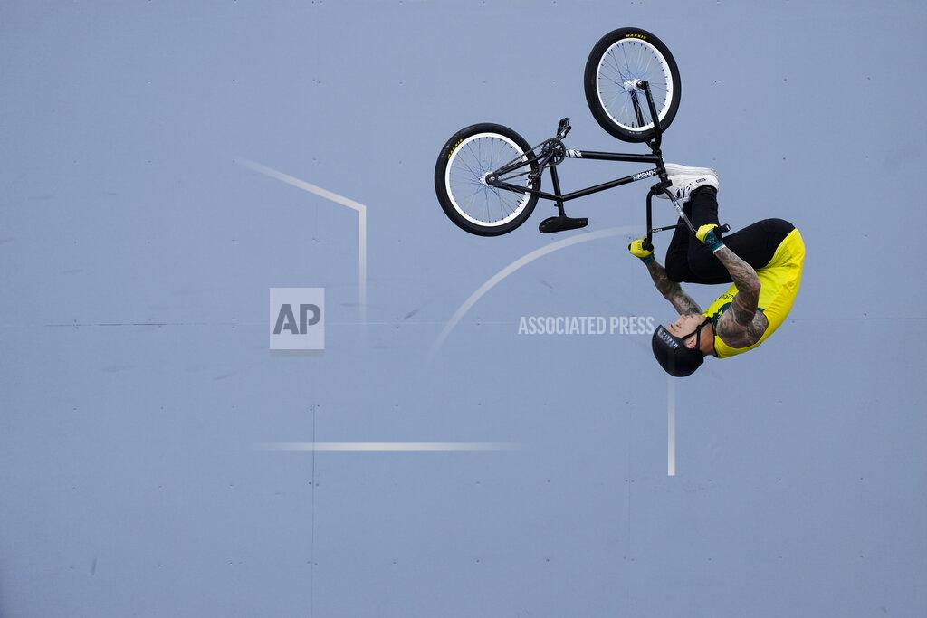 Logan Martin of Australia makes a jump in the men's BMX Freestyle seeding at the 2020 Summer Olympics, Saturday, July 31, 2021, in Tokyo, Japan. (AP Photo/Ben Curtis)