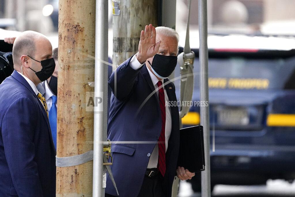 Matt Slocum President-elect Joe Biden waves as he arrives at The Queen theater, Friday, Jan. 15, 2021, in Wilmington, Del. (AP Photo/Matt Slocum)
