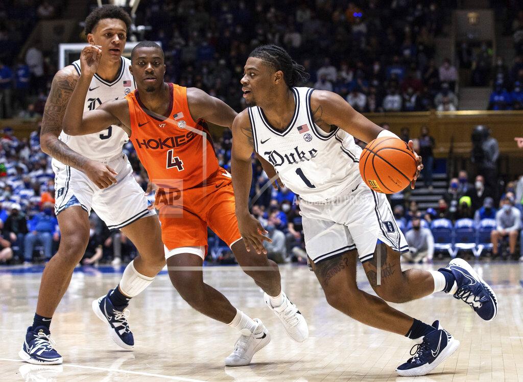 Ben Mckeown Duke's Trevor Keels (1) dribbles around Virginia Tech's Nahiem Alleyne (4) during the second half of an NCAA college basketball game in Durham, N.C., Wednesday, Dec. 22, 2021. (AP Photo/Ben McKeown)