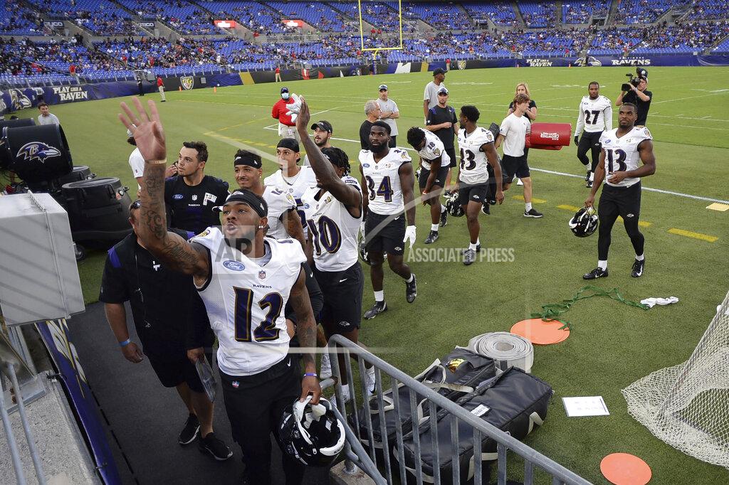Gail Burton Baltimore Ravens' Rashad Bateman (120 waves to fans after practice at NFL football training camp Saturday, July 31, 2021, in Baltimore. (AP Photo/Gail Burton)