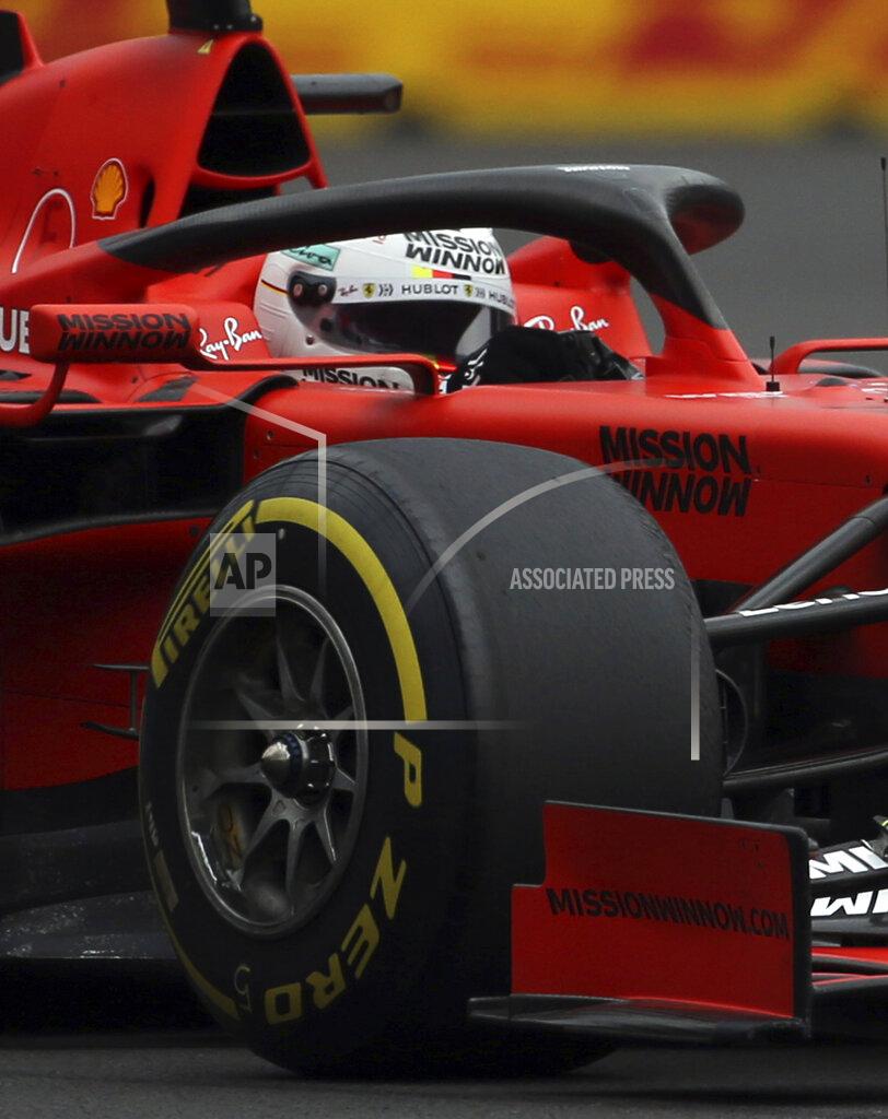 Ferrari driver Sebastian Vettel, of Germany, drives his car during a training session of the Formula One Mexico Grand Prix auto race at the Hermanos Rodriguez racetrack in Mexico City, Friday, Oct. 25, 2019. (AP Photo/Marco Ugarte)