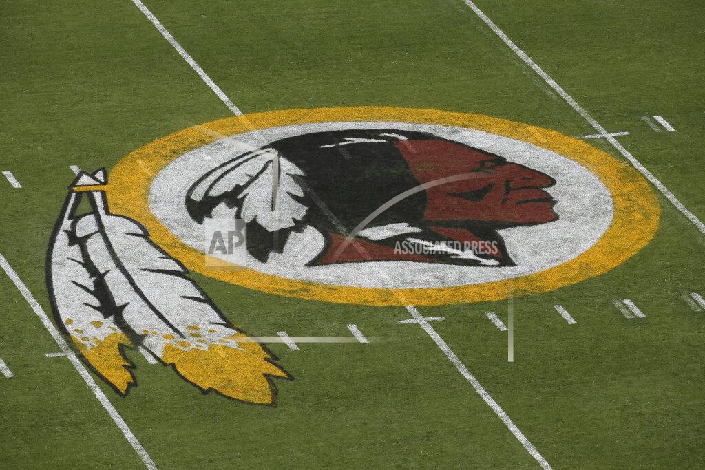 Alex Brandon FILE - In this Aug. 7, 2014, file photo, the Washington Redskins logo is seen on the field before the team's NFL football preseason game against the New England Patriots in Landover, Md. Washington’s NFL team will get rid of the name "Redskins" on Monday, July 13, according to multiple reports. It’s unclear when a new name will be revealed for one of the league’s oldest franchises. The team launched a "thorough review" of the name July 3. (AP Photo/Alex Brandon, File)