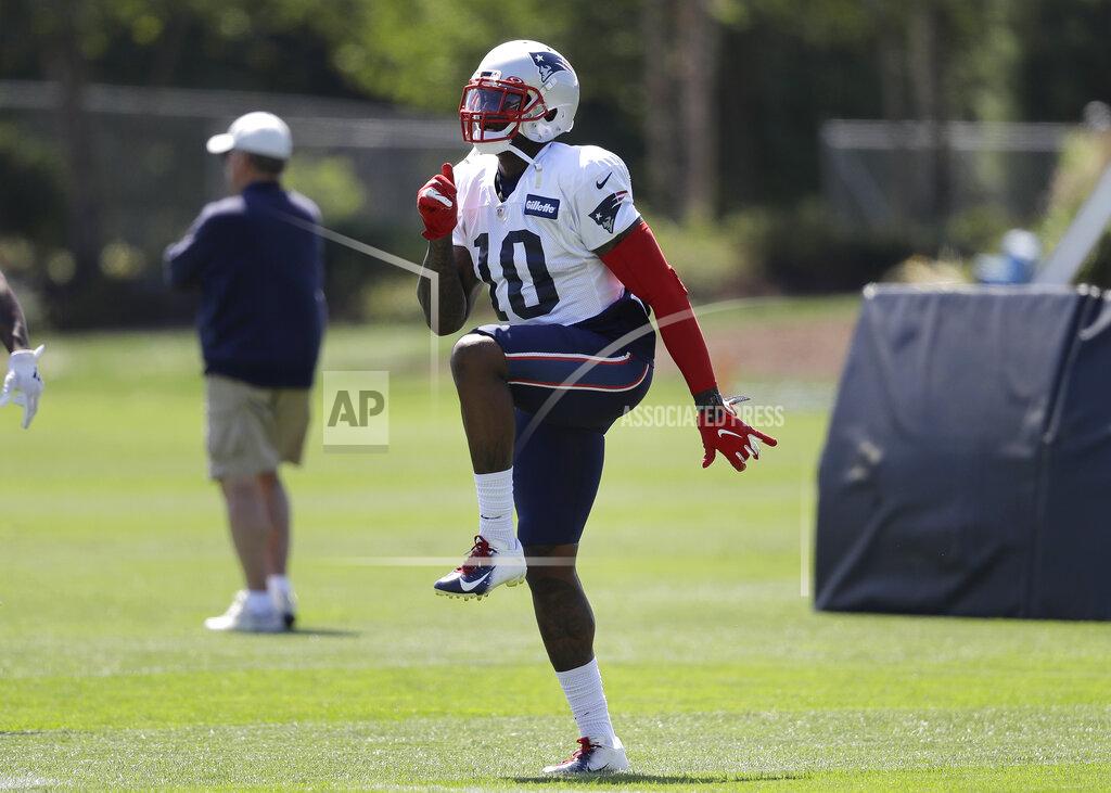 Steven Senne New England Patriots wide receiver Josh Gordon (10) warms up during an NFL football practice, Monday, Aug. 26, 2019, in Foxborough, Mass. (AP Photo/Steven Senne)