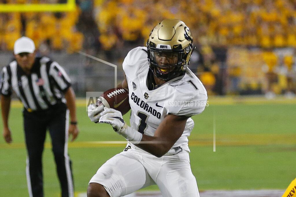Rick Scuteri Colorado running back Jaren Mangham carries for a first down against Arizona State during the first half of an NCAA college football game Saturday, Sept. 21, 2019, in Tempe, Ariz. (AP Photo/Rick Scuteri)