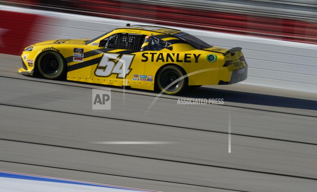 Brynn Anderson Martin Truex Jr. drives during a NASCAR Xfinity Series at Atlanta Motor Speedway on Saturday, March 20, 2021, in Hampton, Ga. (AP Photo/Brynn Anderson)