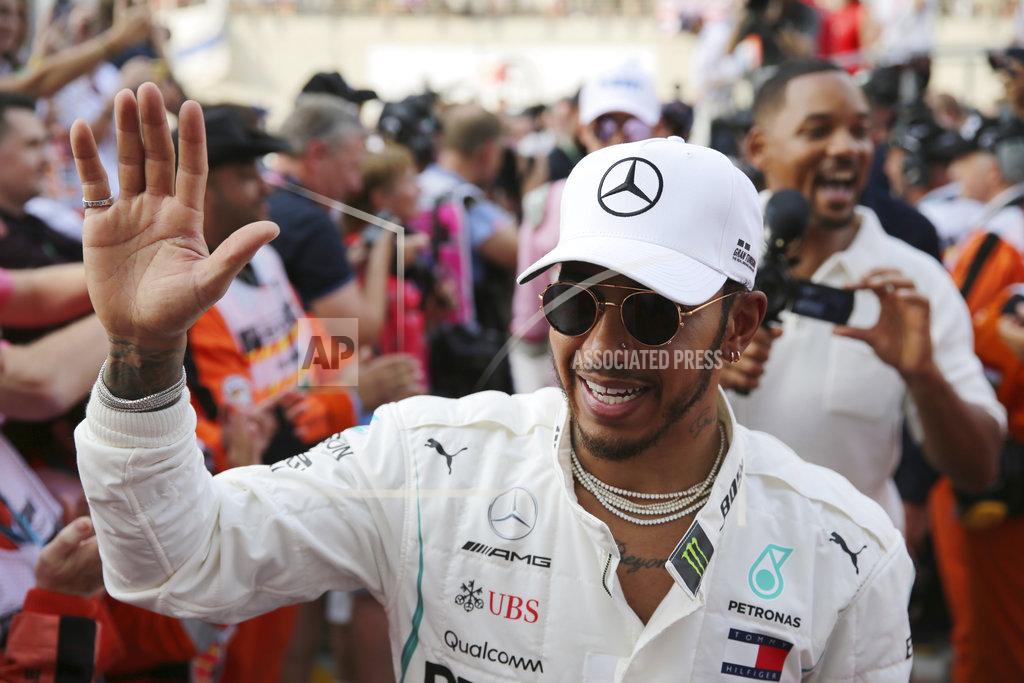 World champion Hamilton wins season-ending Abu Dhabi GP