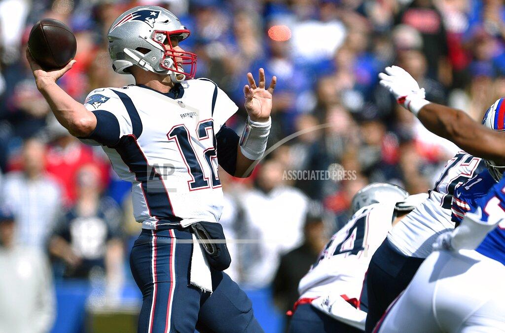 Adrian Kraus New England Patriots quarterback Tom Brady drops back to pass against the Buffalo Bills in the first half of an NFL football game, Sunday, Sept. 29, 2019, in Orchard Park, N.Y. (AP Photo/Adrian Kraus)