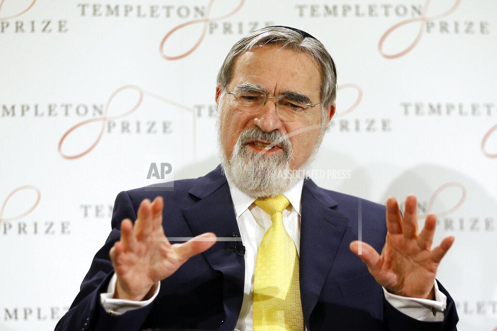 Kirsty Wigglesworth FILE - In this March 2, 2016, file photo, Rabbi Lord Jonathan Sacks speaks at a news conference announcing his winning of the 2016 Templeton Prize, in London. Sacks, the former chief rabbi in the U.K. who reached beyond the Jewish community with his regular broadcasts on radio, died at 72 on Saturday, Nov. 7, 2020, according to a statement. (AP Photo/Kirsty Wigglesworth, File)