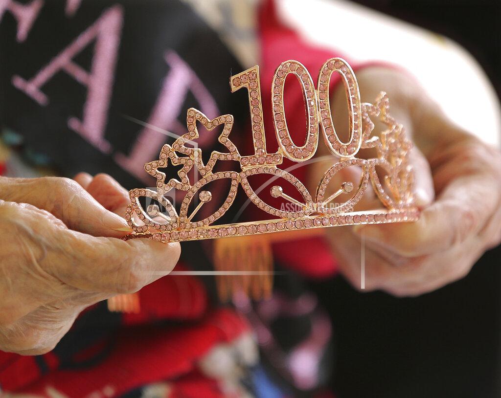 Curtis Compton COVID-19 survivor Irma Gooden holds her tiara while celebrating her 100th birthday at Westbury Medical Care & Rehabilitation on Tuesday, June 16, 2020, in Jackson, Ga. Gooden is one of 84 residents at Westbury Medical Care and Rehab who tested positive for COVID-19 and has since recovered. Westbury is one of the hardest-hit senior care homes in the state, with 34 deaths among its 123 residents who tested positive for COVID-19. More than three dozen workers at the facility also tested positive and one died. Statewide, more than half of the state's senior care homes have had at least one confirmed coronavirus case among residents or staff. As of Monday, 6,402 long-term care residents have tested positive and 1,139 have died, according to reports made to the Georgia Department of Community Health. More than 2,800 long-term care workers statewide have also tested positive. (Curtis Compton/Atlanta Journal-Constitution via AP)