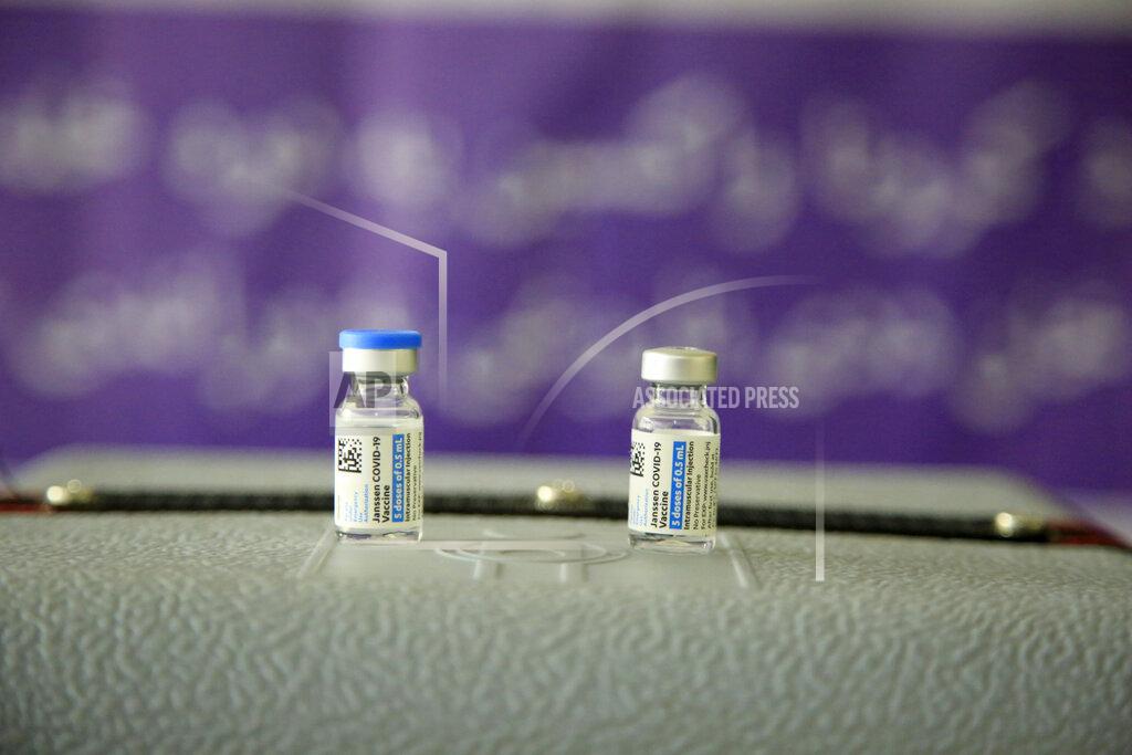 Mariam Zuhaib Vials of the Johnson & Johnson COVID-19 vaccine sit on a tray at Kabul University as students are vaccinated in Afghanistan, Thursday, July 29, 2021. (AP Photo/Mariam Zuhaib)