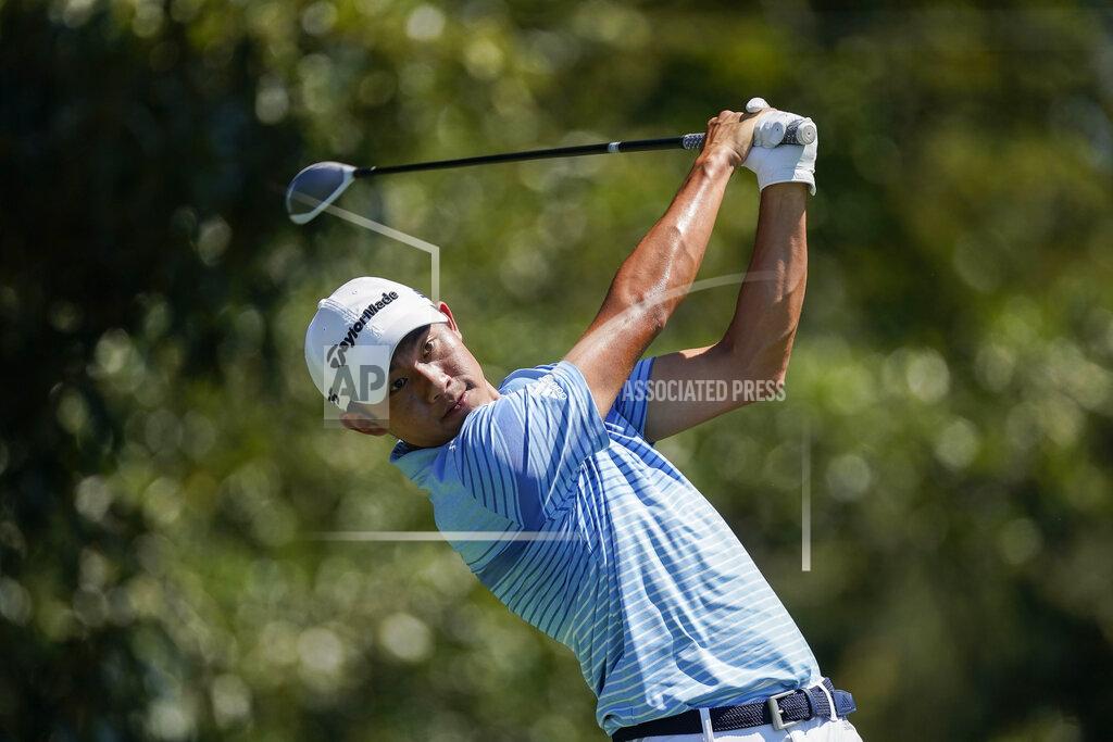 John Bazemore Collin Morikawa hits his tee shot on the third hole during the final round of the Tour Championship golf tournament at East Lake Golf Club in Atlanta, Monday, Sept. 7, 2020. (AP Photo/John Bazemore)