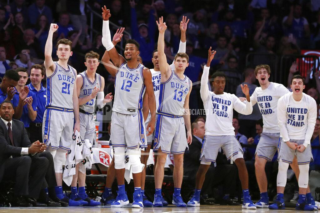 Kathy Willens Duke players react from the bench during the first half of the first round of the 2K Empire Classic NCAA college basketball tournament against California, Thursday, Nov. 21, 2019, in New York. (AP Photo/Kathy Willens)