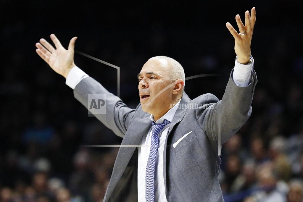 John Minchillo FILE - In this Feb. 9, 2019, file photo, DePaul head coach Dave Leitao reacts during the second half of an NCAA college basketball game, in Cincinnati. The NCAA suspended men’s basketball coach Dave Leitao for the first three games of the regular season Tuesday, July 23, 2019, saying he should have done more to prevent recruiting violations by his staff. The NCAA also put the Big East program on three years of probation, issued a $5,000 fine and said an undetermined number of games will be vacated because DePaul put an ineligible player on the floor. An unidentified former associate head coach is also facing a three-year show cause order for his role in the violations.(AP Photo/John Minchillo, File)