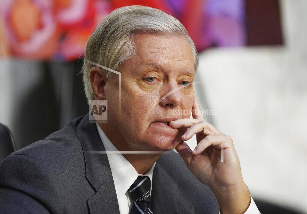 Kevin Dietsch Sen. Lindsey Graham, R-S.C., listens during a confirmation hearing for Supreme Court nominee Amy Coney Barrett before the Senate Judiciary Committee, Monday, Oct. 12, 2020, on Capitol Hill in Washington. (Kevin Dietsch/Pool via AP)