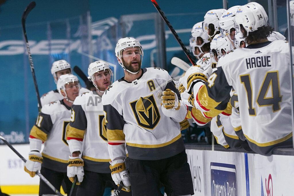 Jeff Chiu Vegas Golden Knights defenseman Alex Pietrangelo, middle, is congratulated by teammates after scoring against the San Jose Sharks during the first period of an NHL hockey game in San Jose, Calif., Wednesday, May 12, 2021. (AP Photo/Jeff Chiu)