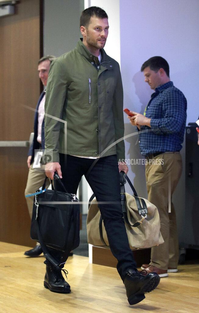 Charles Krupa FILE - In this Oct. 4, 2018, file photo, New England Patriots quarterback Tom Brady arrives to speak to the media following an NFL football game against the Indianapolis Colts in Foxborough, Mass. Tom Brady is an NFL free agent for the first time in his career. The 42-year-old quarterback with six Super Bowl rings said Tuesday morning, March 17, 2020, that he is leaving the New England Patriots. (AP Photo/Charles Krupa, File)