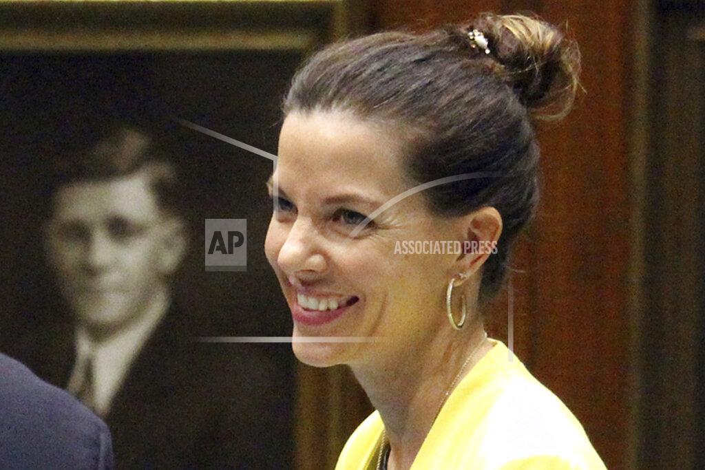 Bob Christie FILE - In this Jan. 31, 2017, file photo, is then-Arizona State Rep. Michelle Ugenti-Rita, R-Scottsdale, during a legislative session at the Capitol in Phoenix. Native American tribes in Arizona say two new state election laws won't make it any easier for their voters. Gov. Doug Ducey recently signed the bills that he and fellow Republicans say will strengthen the integrity of elections. The bills' sponsor, Republican state Sen. Michelle Ugenti-Rita, said claims of retaliation or voter suppression were "outrageous" and "unfounded." Elections aren't a surprise, she said, and voters want them to be run efficiently with timely results. (AP Photo/Bob Christie, File)