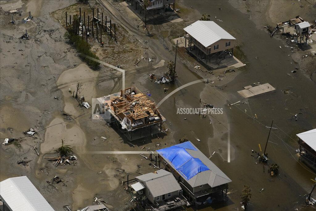 Matt Slocum In this aerial photo, the remains of damaged homes are seen in the aftermath of Hurricane Ida, Monday, Sept. 6, 2021, in Grand Isle, La. (AP Photo/Matt Slocum)