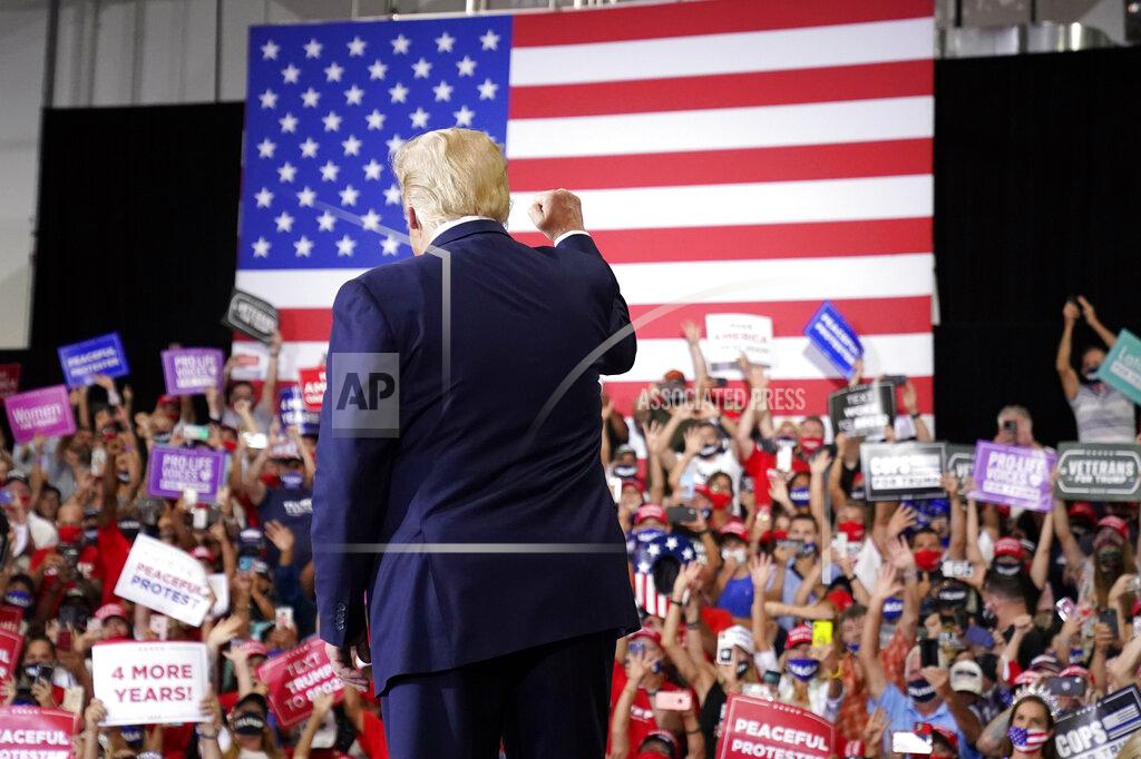Andrew Harnik President Donald Trump arrives to speak at a rally at Xtreme Manufacturing, Sunday, Sept. 13, 2020, in Henderson, Nev. (AP Photo/Andrew Harnik)