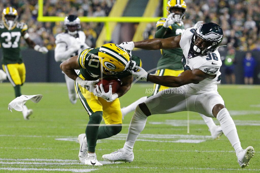 Mike Roemer Green Bay Packers' Darrius Shepherd is stopped by Philadelphia Eagles' Rudy Ford on a punt return during the first half of an NFL football game Thursday, Sept. 26, 2019, in Green Bay, Wis. (AP Photo/Mike Roemer)