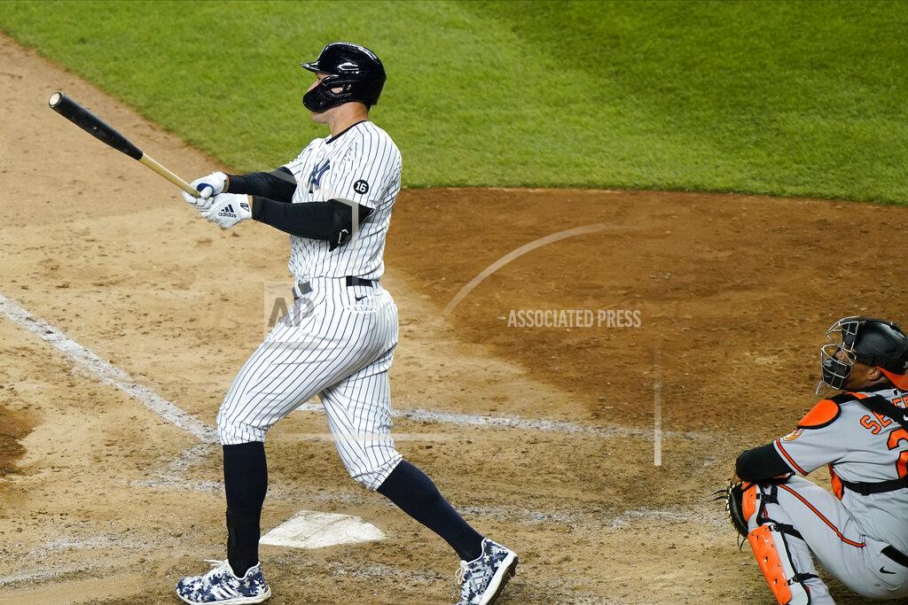 Kathy Willens New York Yankees Aaron Judge and Baltimore Orioles catcher Pedro Severino, lower right, watch Judge's eighth-inning, three-run home run in a baseball game, Tuesday, April 6, 2021, at Yankee Stadium in New York. (AP Photo/Kathy Willens)