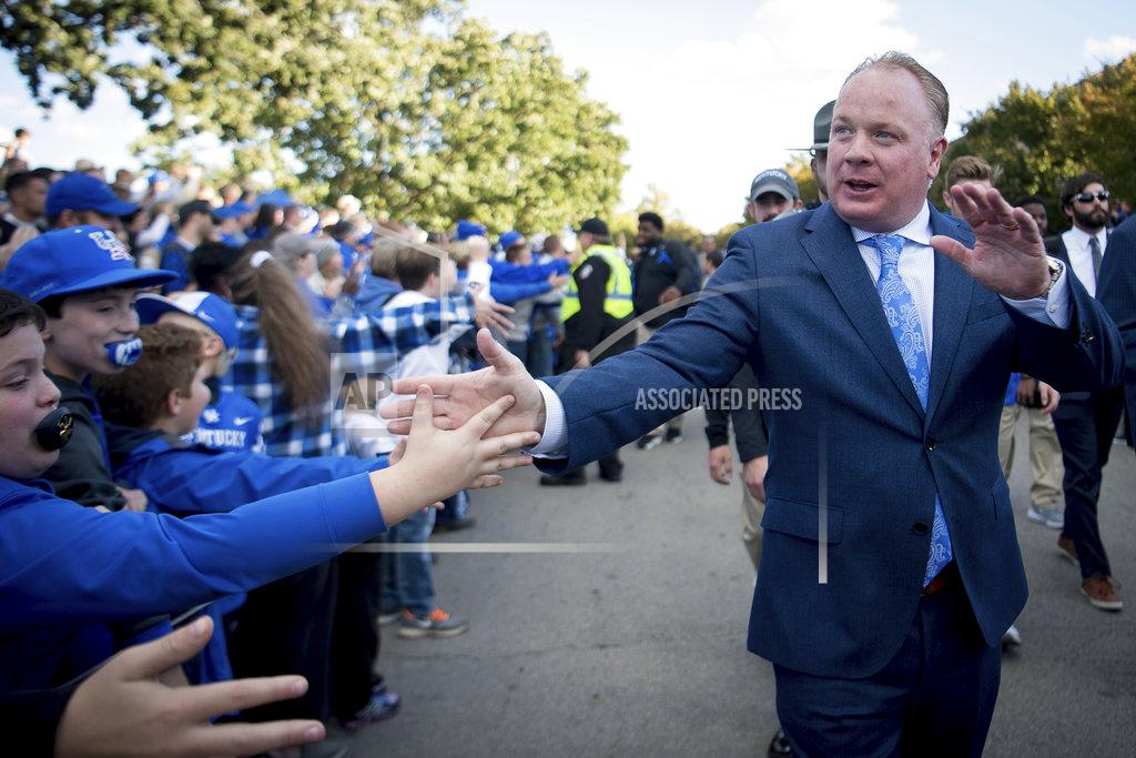 Bryan Woolston Kentucky head coach Mark Stoops greets fans during a pep rally before an NCAA college football game against Vanderbilt in Lexington, Ky., Saturday, Oct. 20, 2018. (AP Photo/Bryan Woolston)