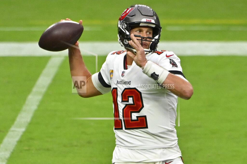 David Becker Tampa Bay Buccaneers quarterback Tom Brady (12) throws against the Las Vegas Raiders during the first half of an NFL football game, Sunday, Oct. 25, 2020, in Las Vegas. (AP Photo/David Becker)