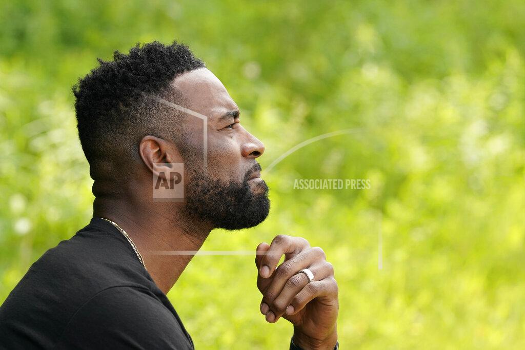 Carlos Osorio Calvin Johnson is interviewed in Webberville, Mich., Friday, June 4, 2021. Former Detroit Lions wide receiver Calvin Johnson, to be inducted into the Pro Football Hall of Fame on Aug. 8, has founded a cannabis business and is collaborating with Harvard University to research how marijuana can help people with CTE and chronic pain. (AP Photo/Carlos Osorio)