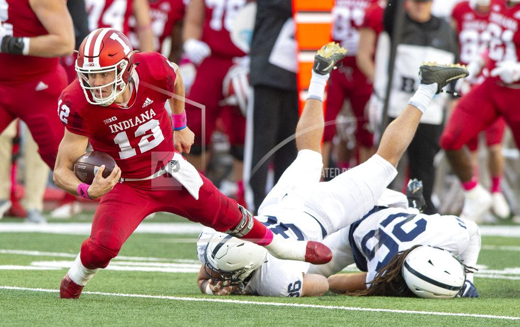 Doug Mcschooler Indiana quarterback Peyton Ramsey (12) makes a run into first-down territory during the second half of an NCAA college football game against Penn State Saturday, Oct. 20, 2018, in Bloomington, Ind. Penn State won 33-28. (AP Photo/Doug McSchooler)