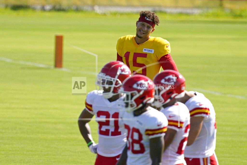 Charlie Riedel Kansas City Chiefs quarterback Patrick Mahomes (15) watches practice at NFL football training camp Tuesday, Aug. 17, 2021, in St. Joseph, Mo. (AP Photo/Charlie Riedel)