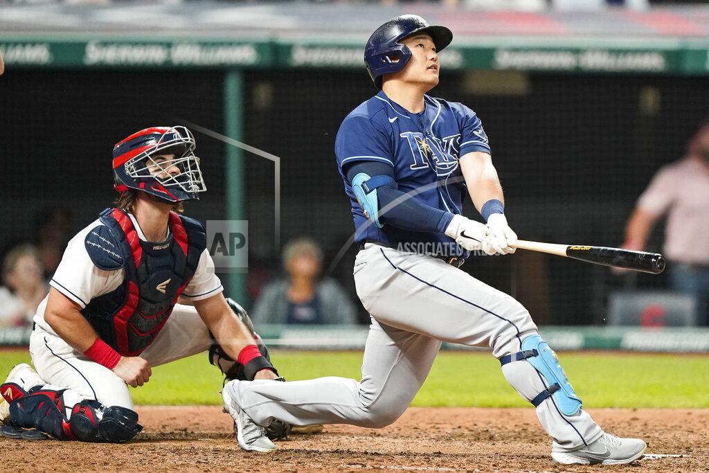 Tony Dejak Tampa Bay Rays' Ji-Man Choi watches his three-run home run next to Cleveland Indians catcher Austin Hedges in the ninth inning of a baseball game Friday, July 23, 2021, in Cleveland. (AP Photo/Tony Dejak)