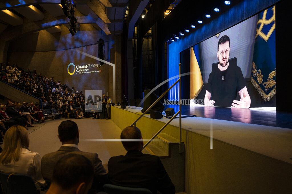 Alessandro Della Valle Ukrainian President Volodymyr Zelenskyy, delivers a speech by video conference during the Ukraine Recovery Conference URC, Monday, July 4, 2022 in Lugano, Switzerland. The URC is organised to initiate the political process for the recovery of Ukraine after the attack of Russia to its territory. (Alessandro della Valle/Keystone via AP)