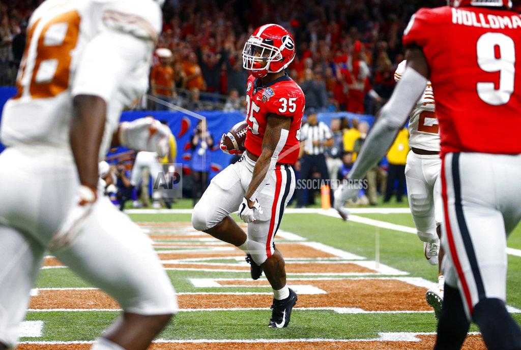 Butch Dill Georgia running back Brian Herrien (35) scores a running touchdown during the first half of the Sugar Bowl NCAA college football game against Texas in New Orleans, Tuesday, Jan. 1, 2019. (AP Photo/Butch Dill)