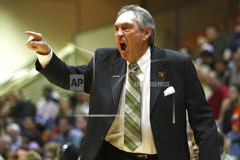 Jeff Lewis FILE - In this Saturday, Feb. 2, 2008, file photo, San Francisco head coach Eddie Sutton coaches against Pepperdine during the second half of an NCAA college basketball game in Malibu, Calif. USF won 88-85 to give Sutton his 800th win. Sutton, the Hall of Fame basketball coach who led three teams to the Final Four and was the first coach to take four schools to the NCAA Tournament, died Saturday, May 23, 2020. He was 84. (AP Photo/Jeff Lewis, File)