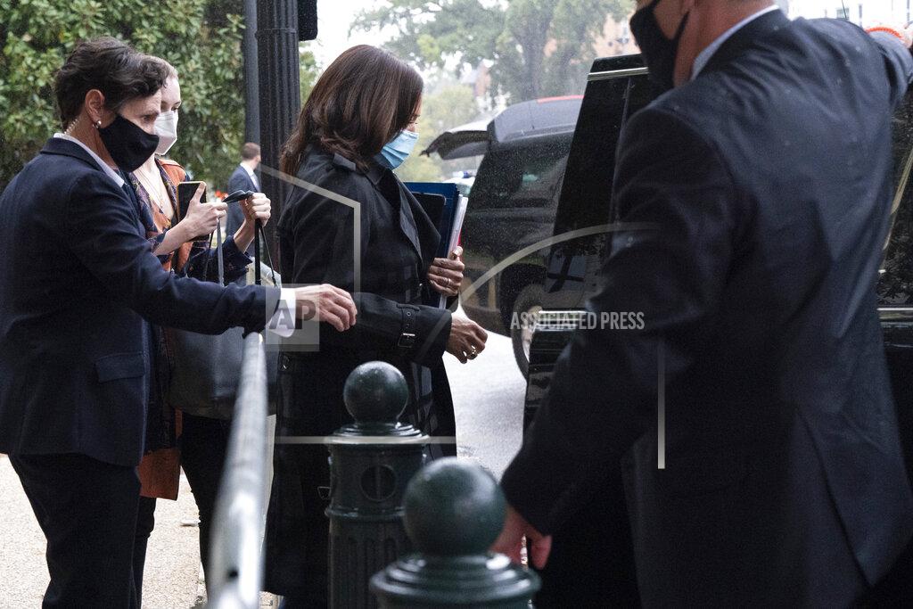 Jacquelyn Martin Democratic vice presidential candidate Sen. Kamala Harris, D-Calif., center, walks to a motorcade after leaving her office, Monday, Oct. 12, 2020, on Capitol Hill in Washington. On Monday, Harris testified remotely from her office during Supreme Court nominee Amy Coney Barrett's confirmation hearing before the Senate Judiciary Committee because of the pandemic. (AP Photo/Jacquelyn Martin)
