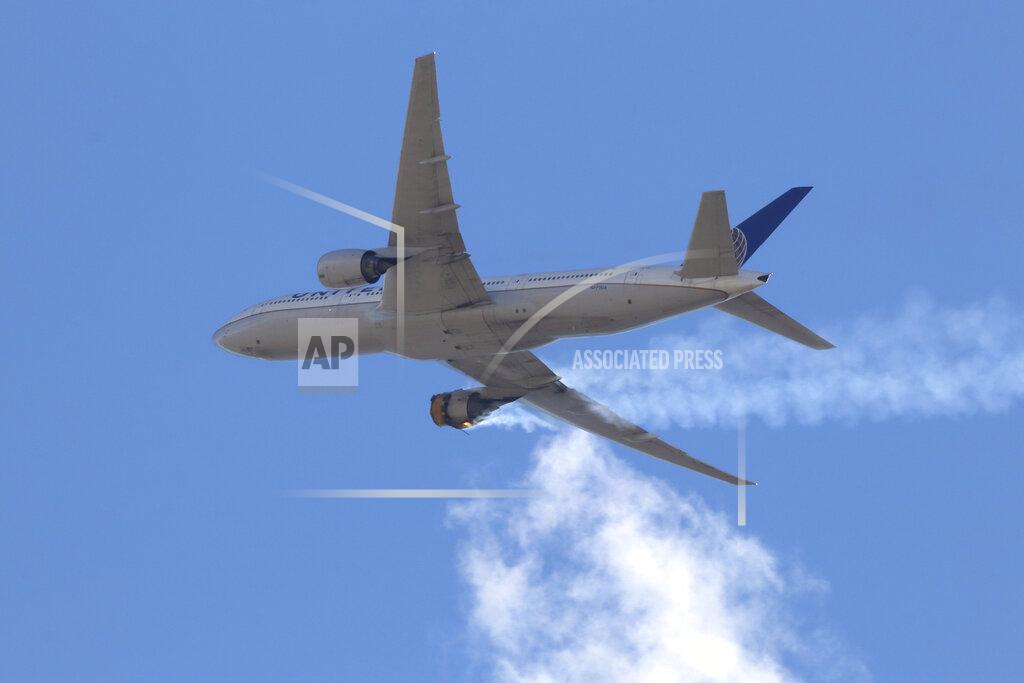 Hayden Smith This Saturday, Feb. 20, 2021 photo provided by Hayden Smith shows United Airlines Flight 328 approaching Denver International Airport, after experiencing "a right-engine failure" shortly after takeoff from Denver. Federal regulators are investigating what caused a catastrophic engine failure on the plane that rained debris on Denver suburbs as the aircraft made an emergency landing. Authorities said nobody aboard or on the ground was hurt despite large pieces of the engine casing that narrowly missed homes below. (Hayden Smith via AP)