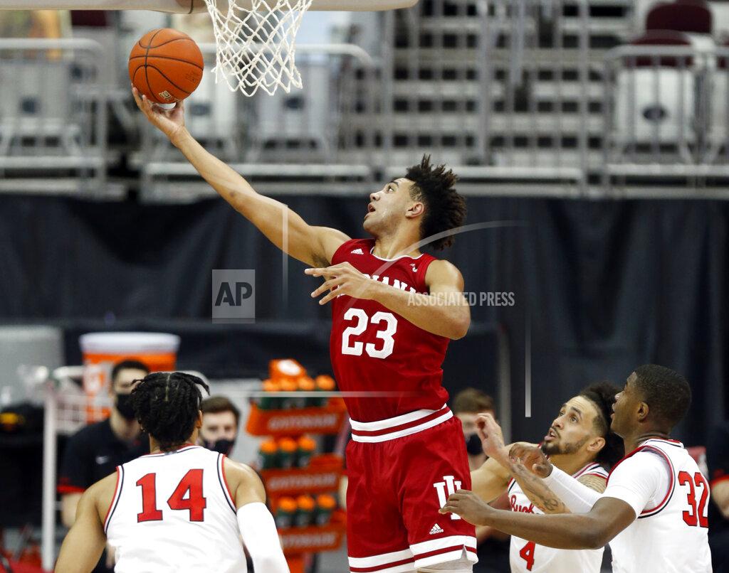 Paul Vernon Indiana forward Trayce Jackson-Davis (23) goes up for a shot against Ohio State forward Justice Sueing (14), guard Duane Washington (4) and forward E.J. Liddell (32) during the first half of an NCAA college basketball game in Columbus, Ohio, Saturday, Feb. 13, 2021. (AP Photo/Paul Vernon)