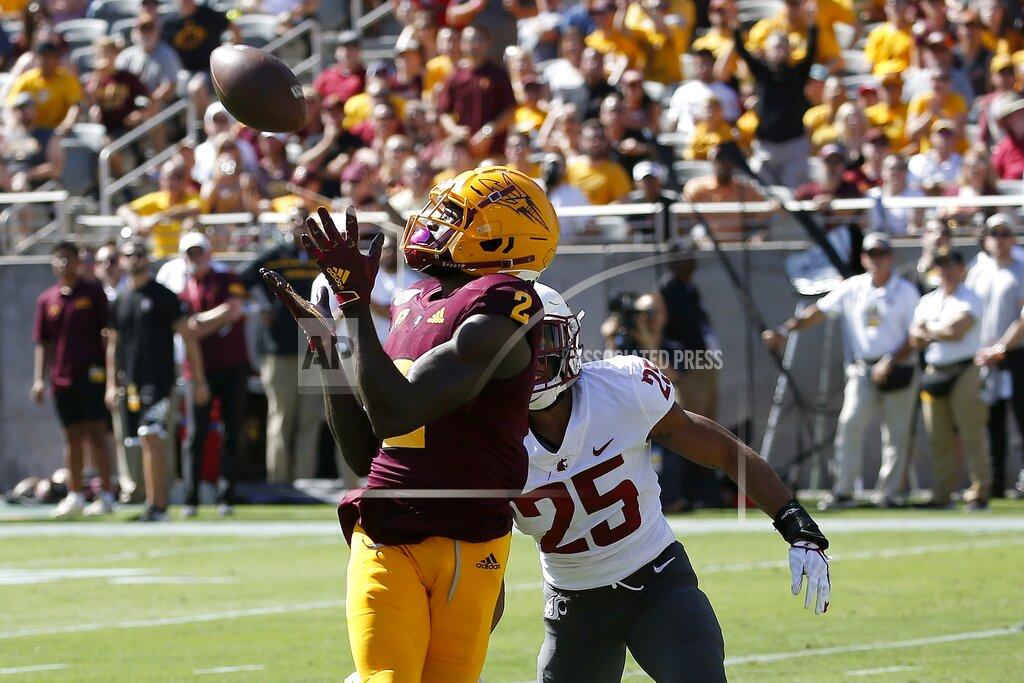 Ross D. Franklin FILE - In this Oct. 12, 2019, file photo, Arizona State wide receiver Brandon Aiyuk (2) reaches out to make a touchdown catch in front of Washington State safety Skyler Thomas (25) during the first half of an NCAA college football game in Tempe, Ariz. This year’s NFL draft features a superb group of wide receivers, including Aiyuk, who are expected to make immediate impacts in the NFL. (AP Photo/Ross D. Franklin, File)